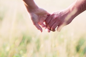 Holding Hands in Field