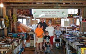 Gail DeKoning and her husband, Neil at one of their their annual book sales